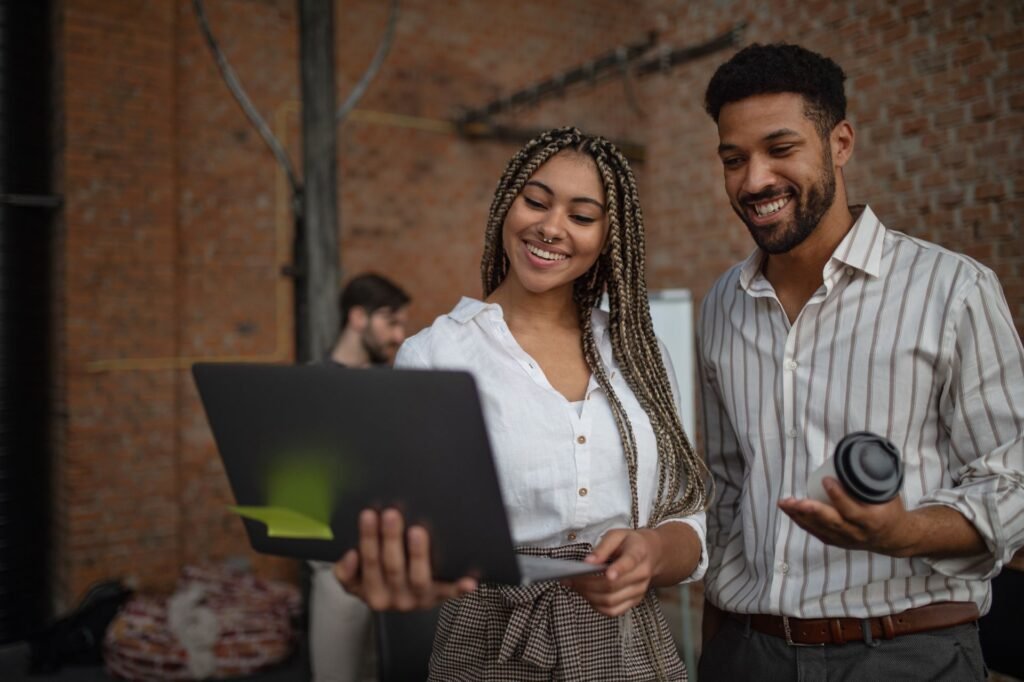 cheerful young businesspeople with tablet working 2023 11 27 05 24 26 utc